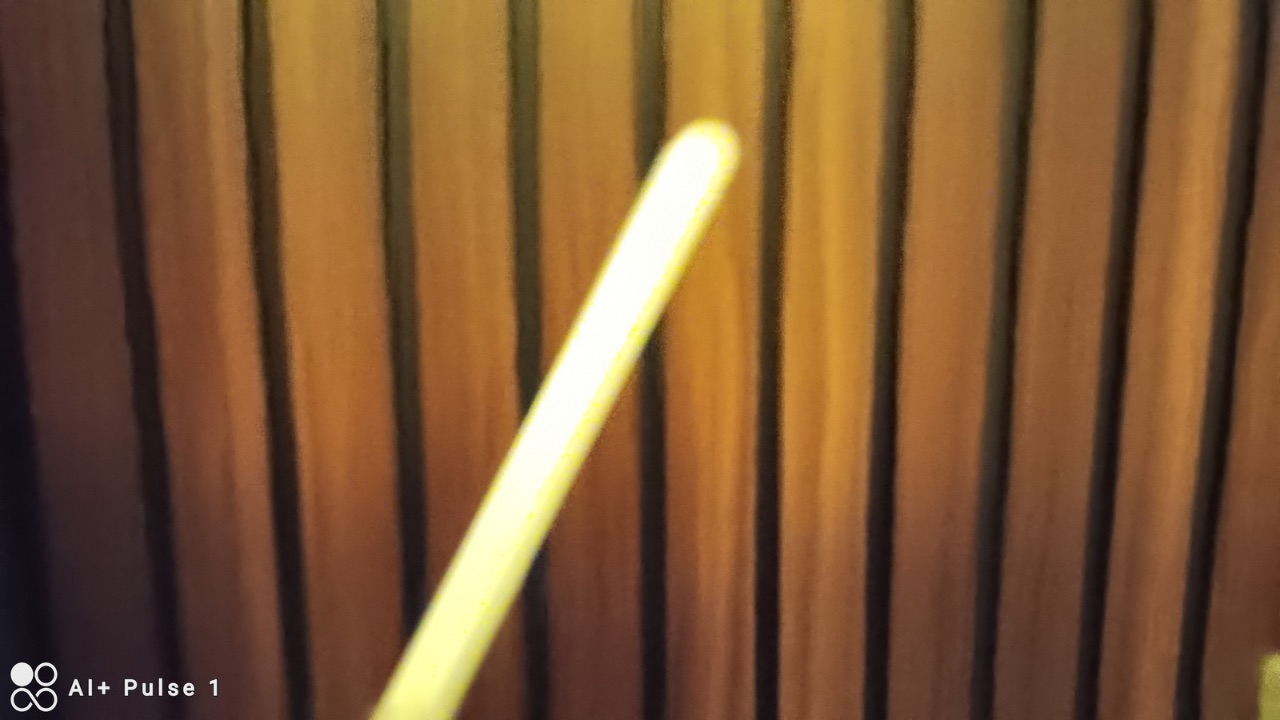 AI+ Pulse indoor blurred